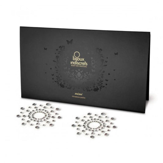 Crystal clear Bijoux Indiscrets Mimi Circles in front of the packaging they come in