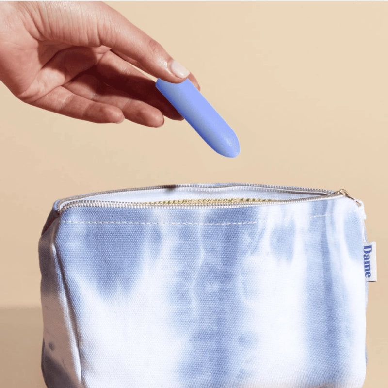 handputtingZeebyDamePeriwinkleinabag