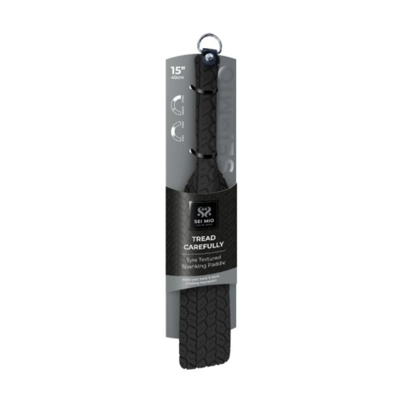Black Sei Mio Tyre Paddle in its packaging showing its textured side